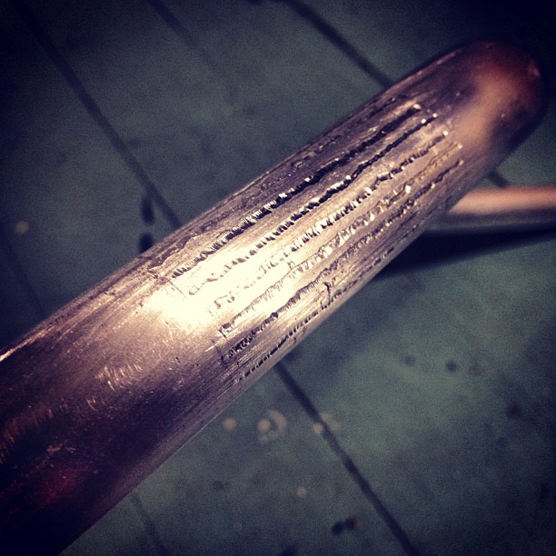 Used the Dremel to create some basic knurling on the Race Inc bars before powder coating.