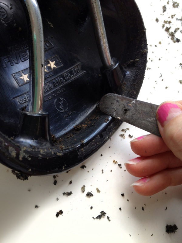 Scraping remaining glue with palette knife — step 9